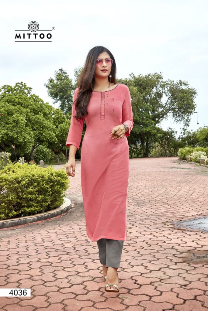 Green colored Beautiful Rayon Straight Kurti Online | www.dvanza.com |