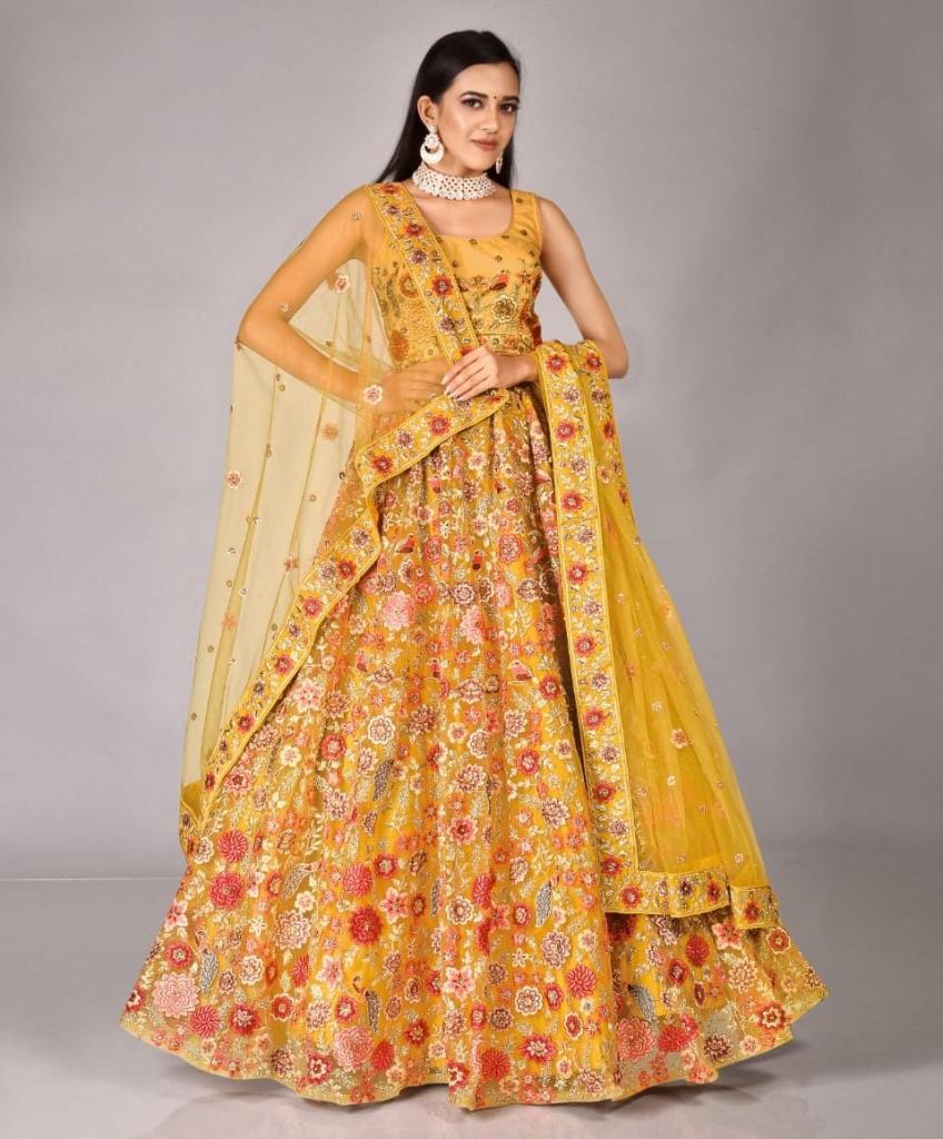 Buy Yellow Net Sequence Embroidered Bridal Lehenga Choli with