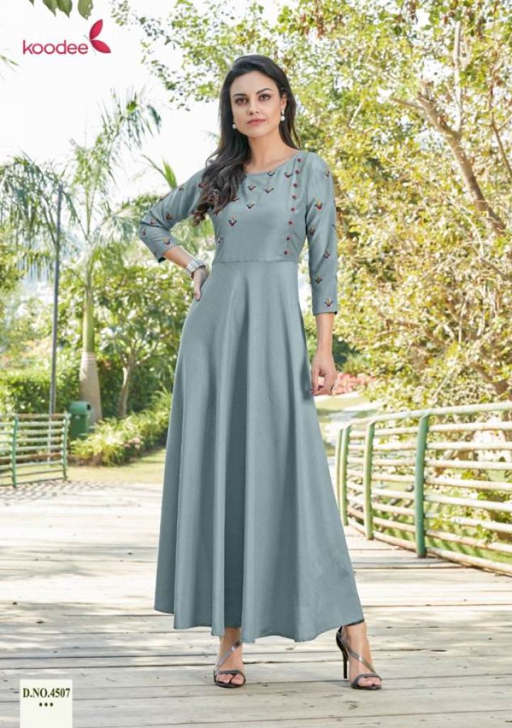 Dark Beige Designer Embroidered Net Kurti Style Lehenga  Sairas Boutique